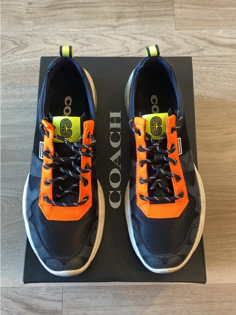 Coach Men’s Black & Orange Athletic Sneakers with Neon Details